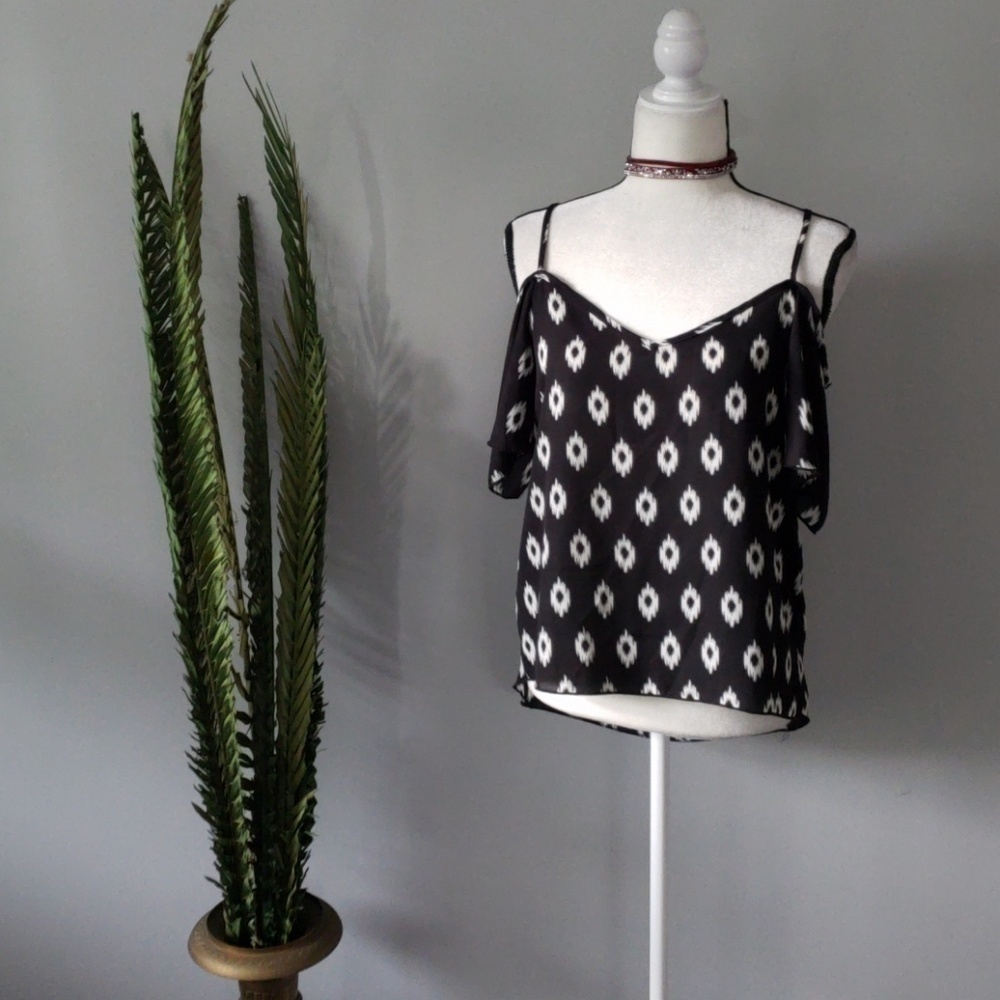 *PRICE DROP*
About A Girl black patterned cold shoulder tank